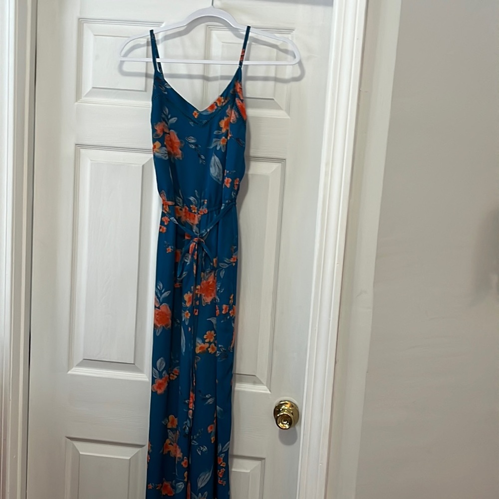 Beautiful blue flowered jumpsuit extra small brand is skies are blue